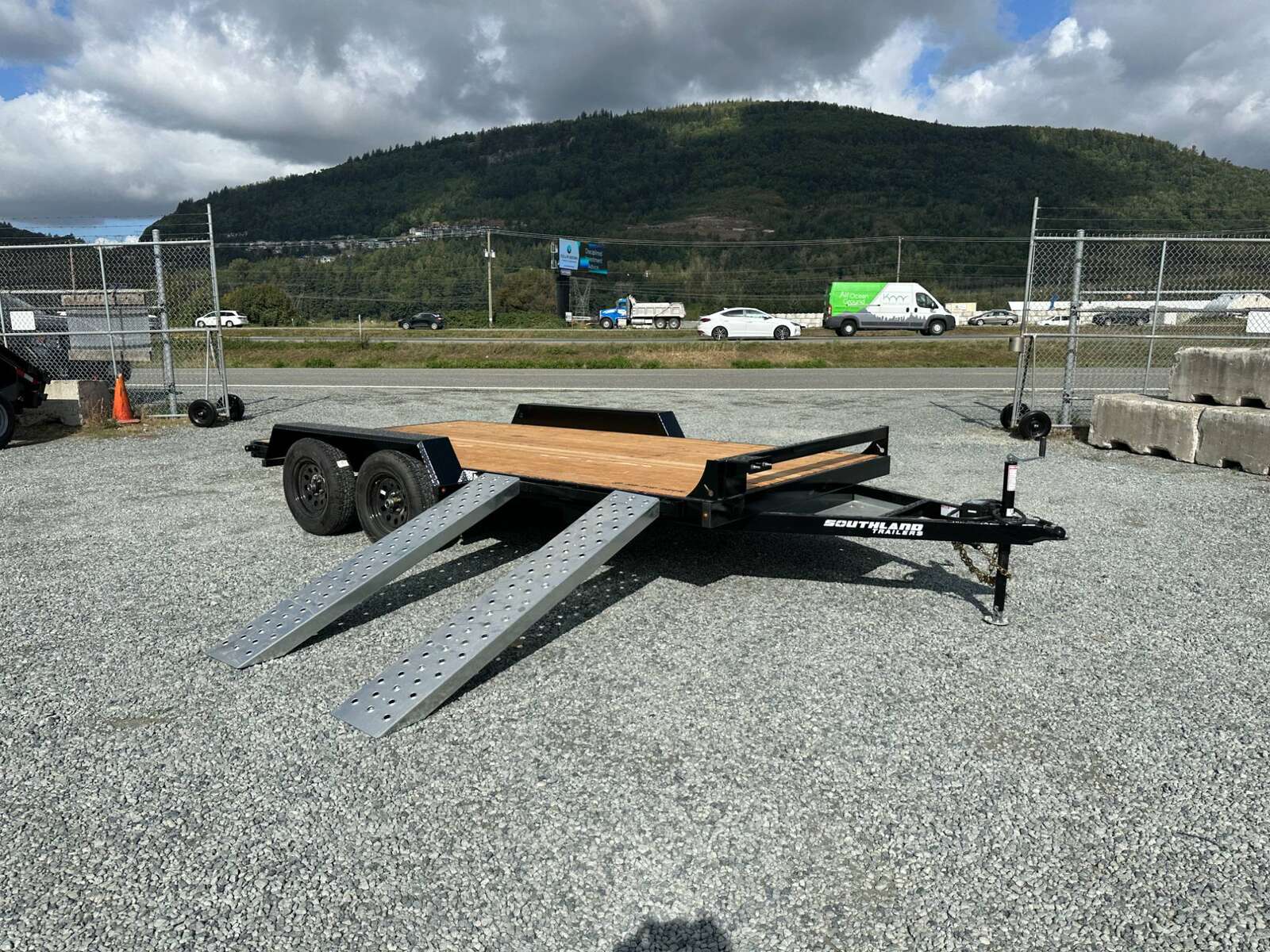 Photo of 2025 Southland 7X14 FLATBED TRAILER FLAT DECK 7,700LB GVW w/ Slide in ramps