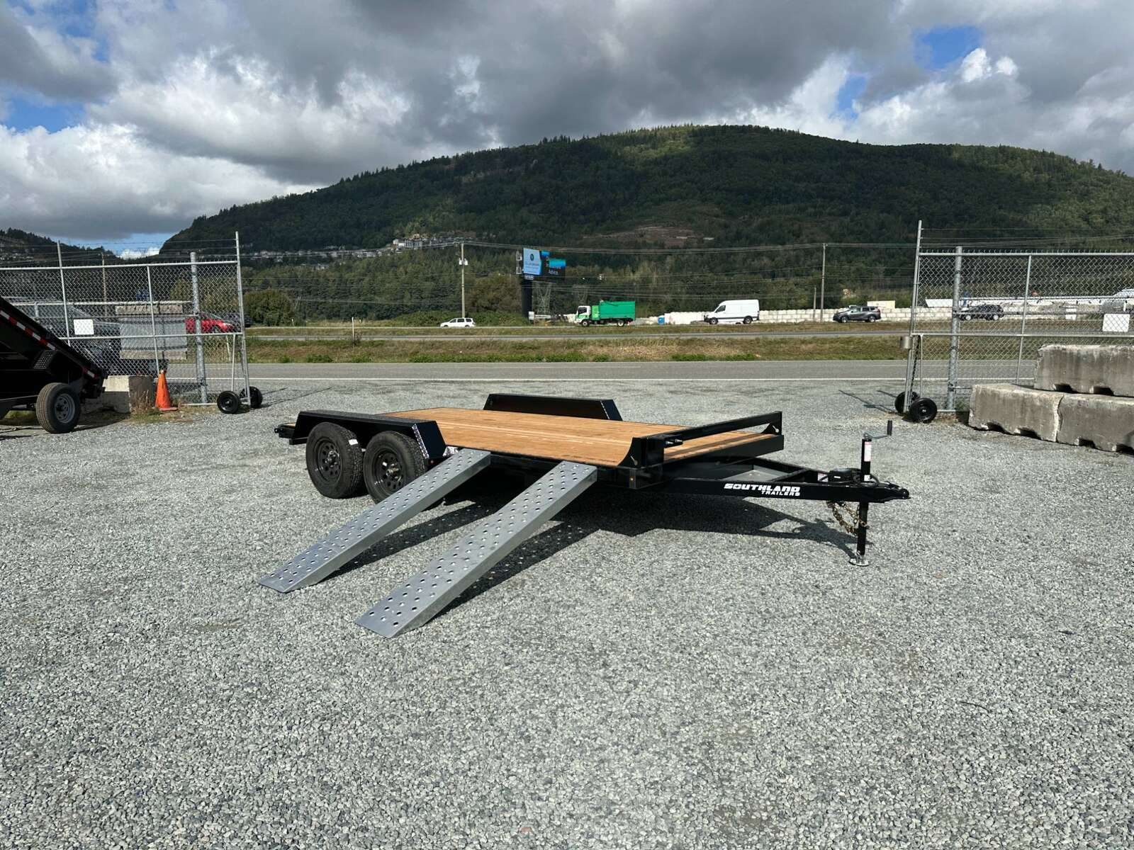 Photo of 2025 Southland 7X14 FLATBED TRAILER FLAT DECK 7,700LB GVW w/ Slide in ramps