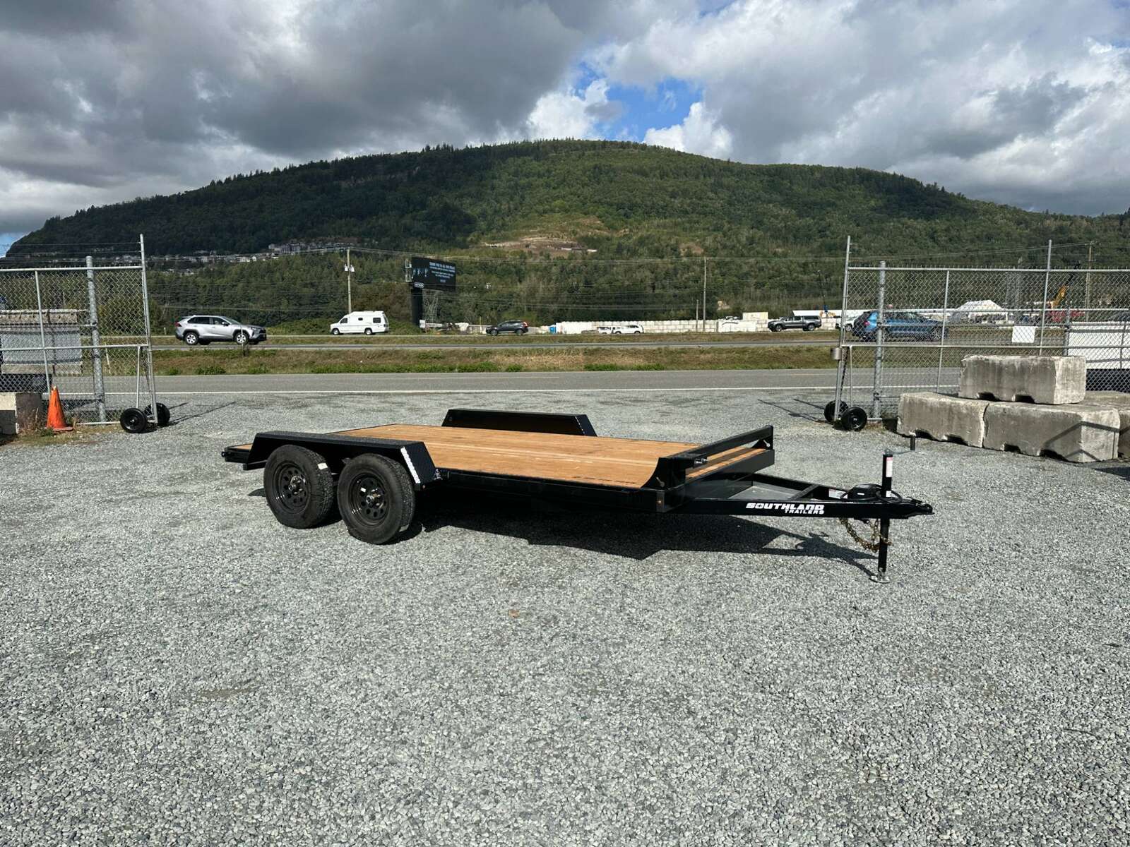 Photo of 2025 Southland 7X14 FLATBED TRAILER FLAT DECK 7,700LB GVW w/ Slide in ramps