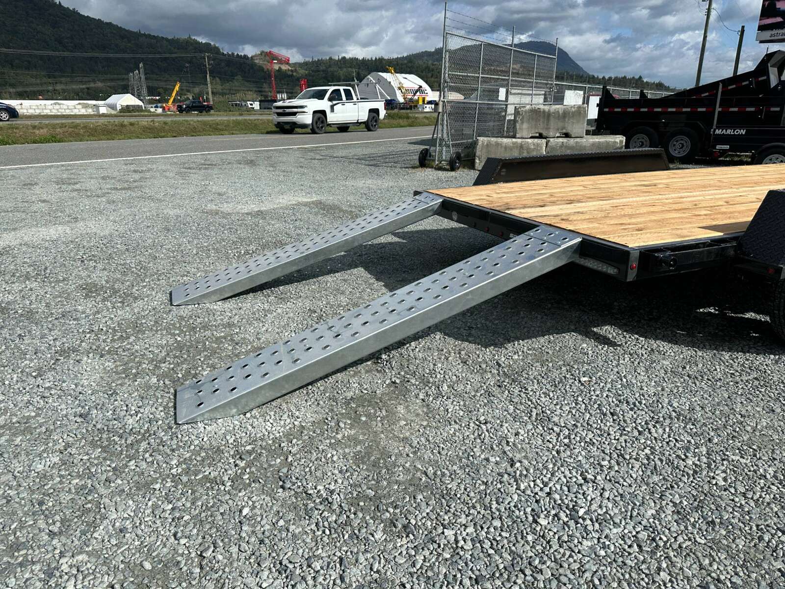 Photo of 2025 Southland 7X14 FLATBED TRAILER FLAT DECK 7,700LB GVW w/ Slide in ramps