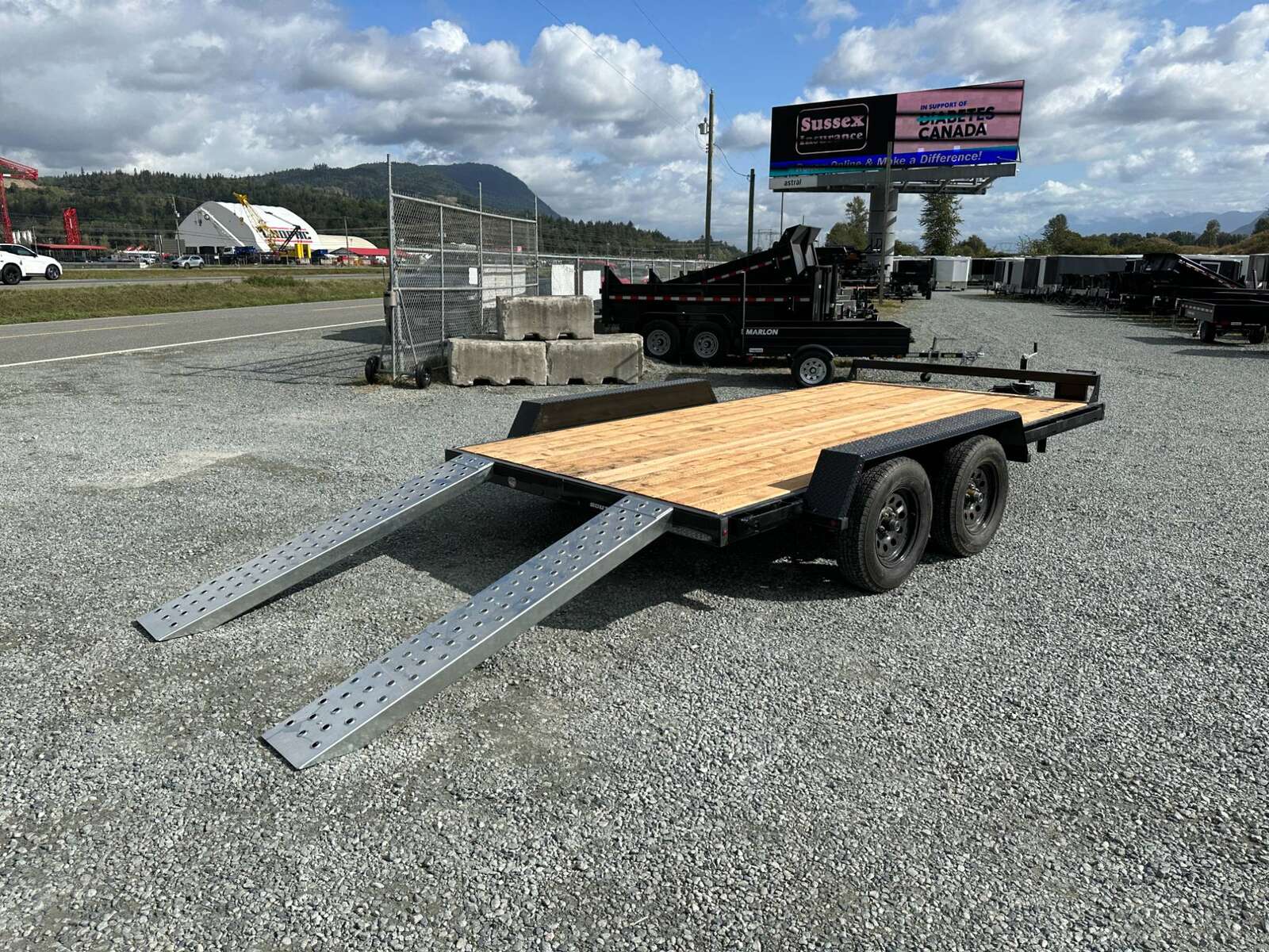Photo of 2025 Southland 7X14 FLATBED TRAILER FLAT DECK 7,700LB GVW w/ Slide in ramps