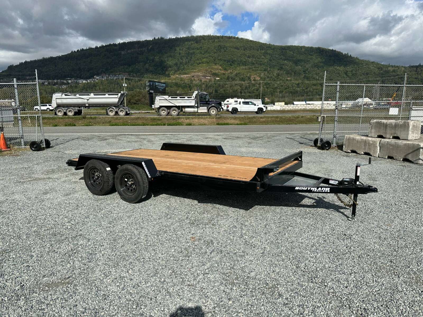 Photo of 2025 Southland 7X14 FLATBED TRAILER FLAT DECK 7,700LB GVW w/ Slide in ramps