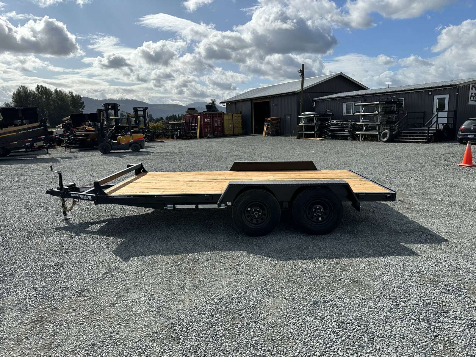 Photo of 2025 Southland 7X14 FLATBED TRAILER FLAT DECK 7,700LB GVW w/ Slide in ramps