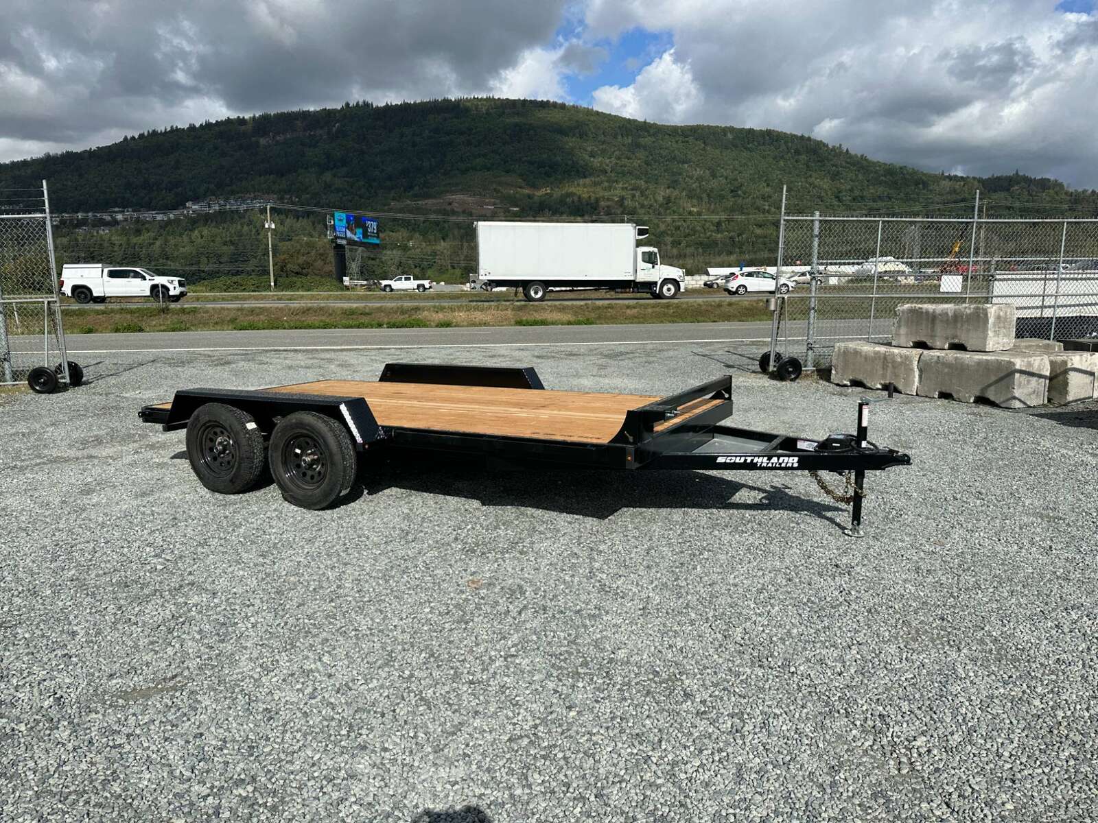 Photo of 2025 Southland 7X14 FLATBED TRAILER FLAT DECK 7,700LB GVW w/ Slide in ramps