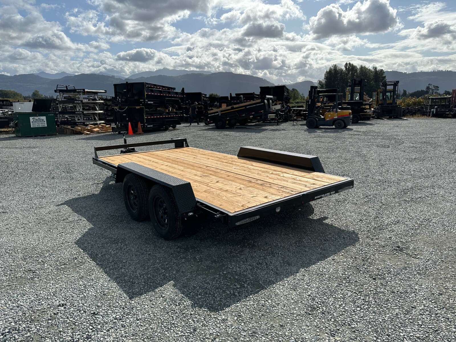 Photo of 2025 Southland 7X14 FLATBED TRAILER FLAT DECK 7,700LB GVW w/ Slide in ramps