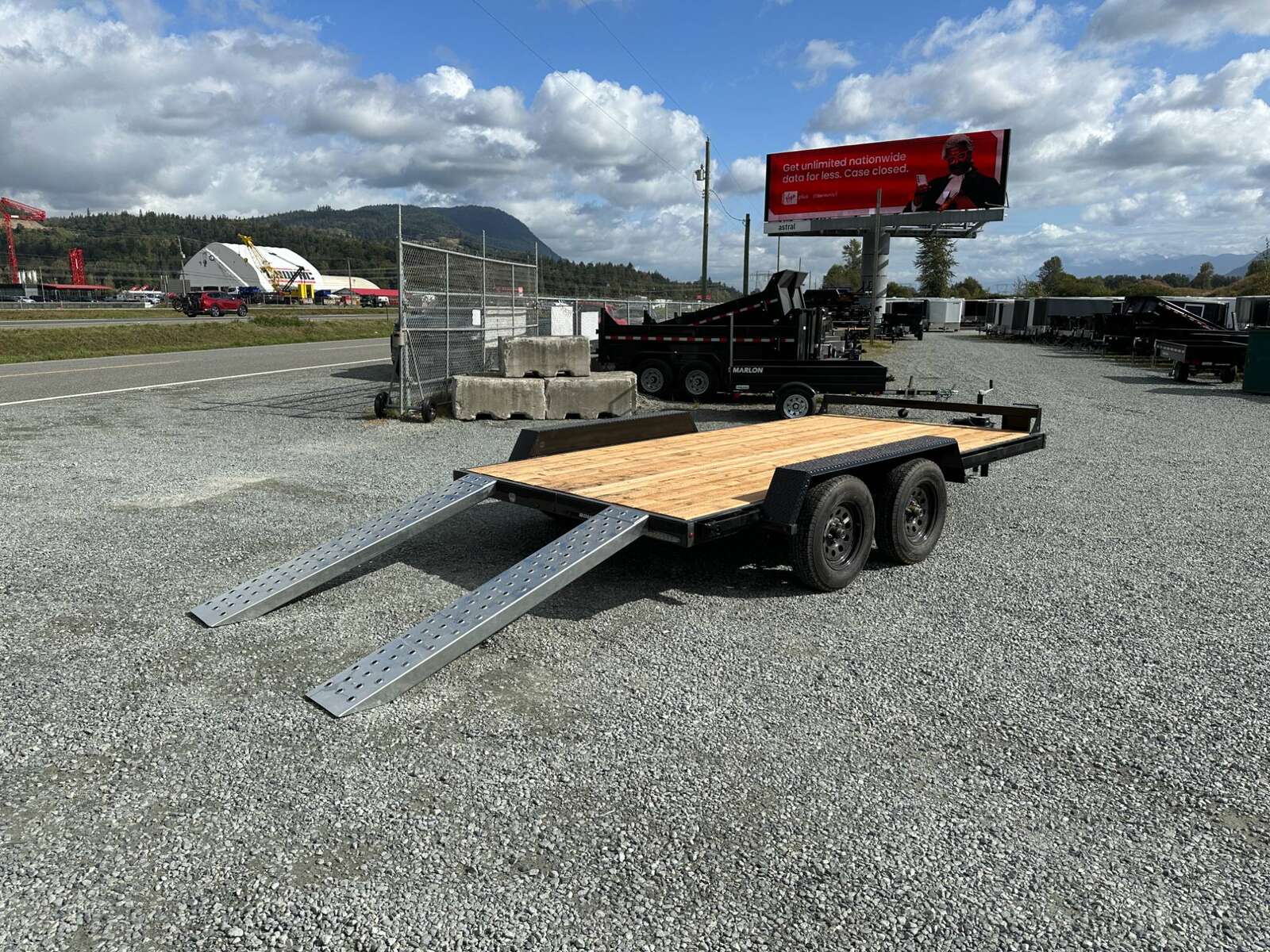 Photo of 2025 Southland 7X14 FLATBED TRAILER FLAT DECK 7,700LB GVW w/ Slide in ramps