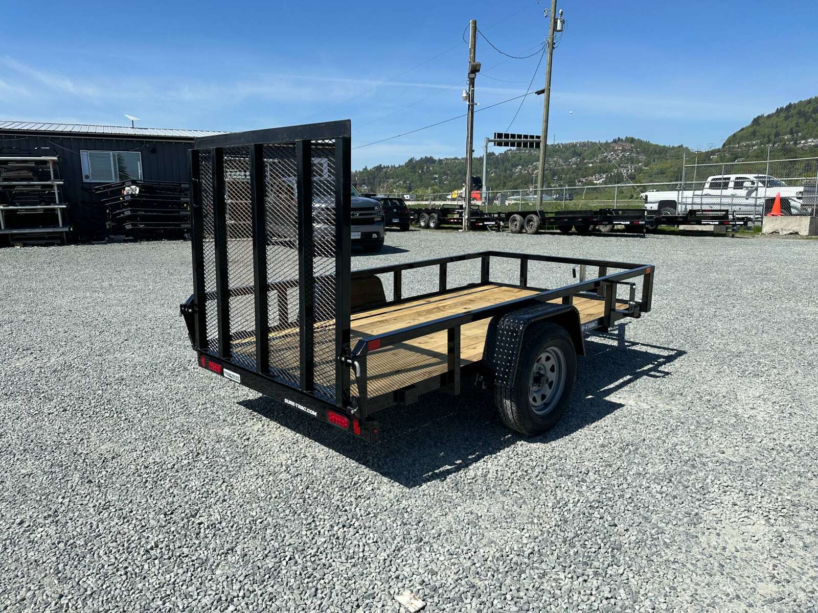 Photo of 2025 Suretrac 5X10 Utility Trailer 2990lb GVW with Ramp Gate