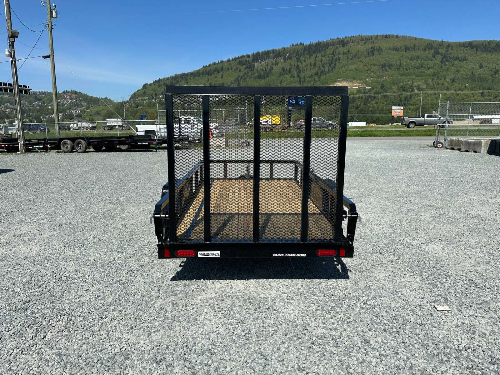 Photo of 2025 Suretrac 5X10 Utility Trailer 2990lb GVW with Ramp Gate