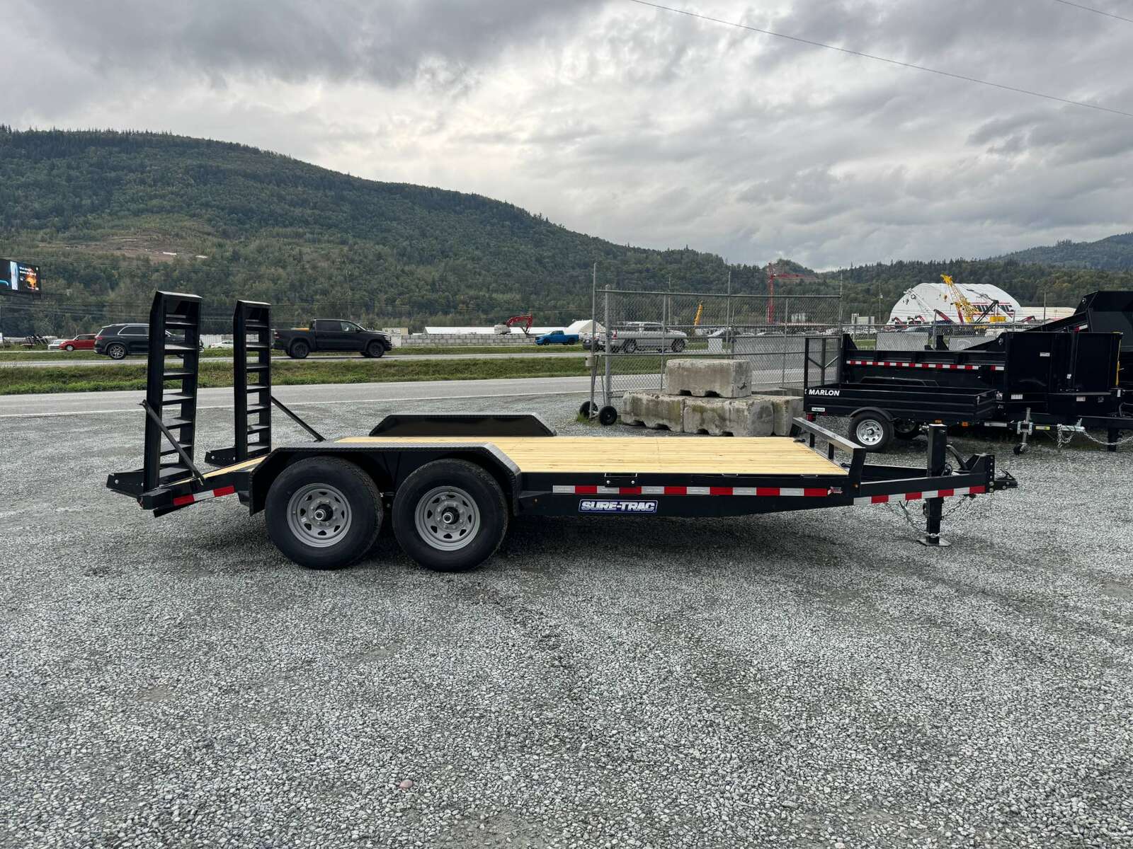 Photo of 2025 Suretrac 7x16 Equipment Trailer 14,000LB GVW Implement Flat Deck w/ Stand Up Ramps