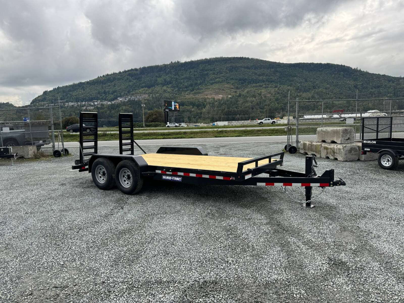Photo of 2025 Suretrac 7x16 Equipment Trailer 14,000LB GVW Implement Flat Deck w/ Stand Up Ramps