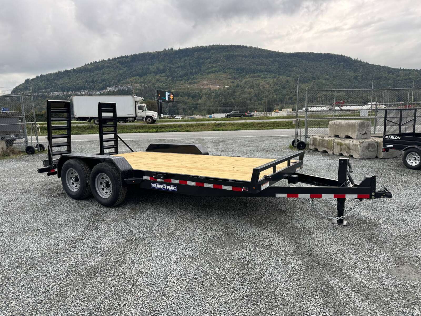 Photo of 2025 Suretrac 7x16 Equipment Trailer 14,000LB GVW Implement Flat Deck w/ Stand Up Ramps