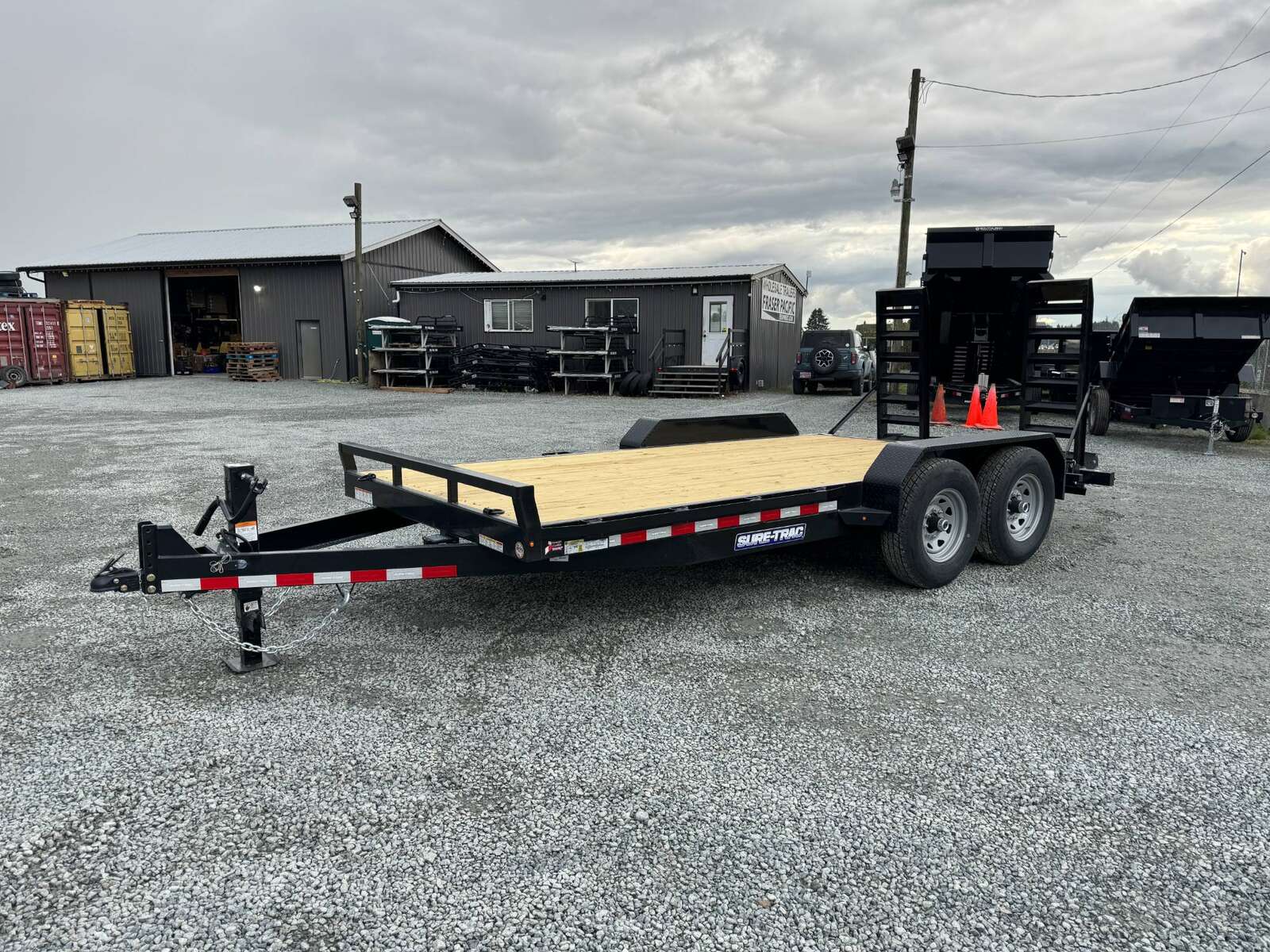 Photo of 2025 Suretrac 7x16 Equipment Trailer 14,000LB GVW Implement Flat Deck w/ Stand Up Ramps