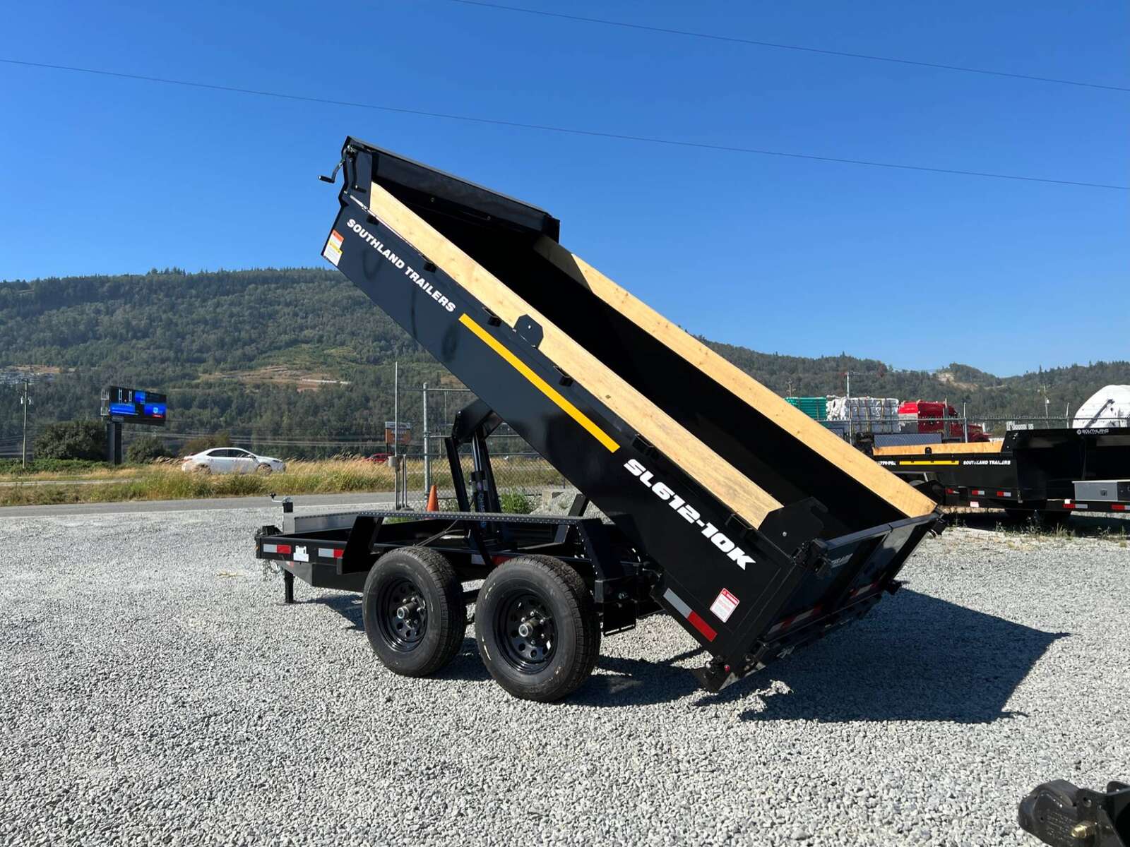 Photo of 2026 Southland 6X12 Dump Trailer 11,400LB GVW with Tarp and Ramps
