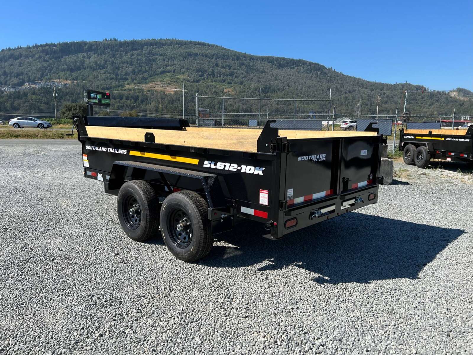 Photo of 2026 Southland 6X12 Dump Trailer 11,400LB GVW with Tarp and Ramps