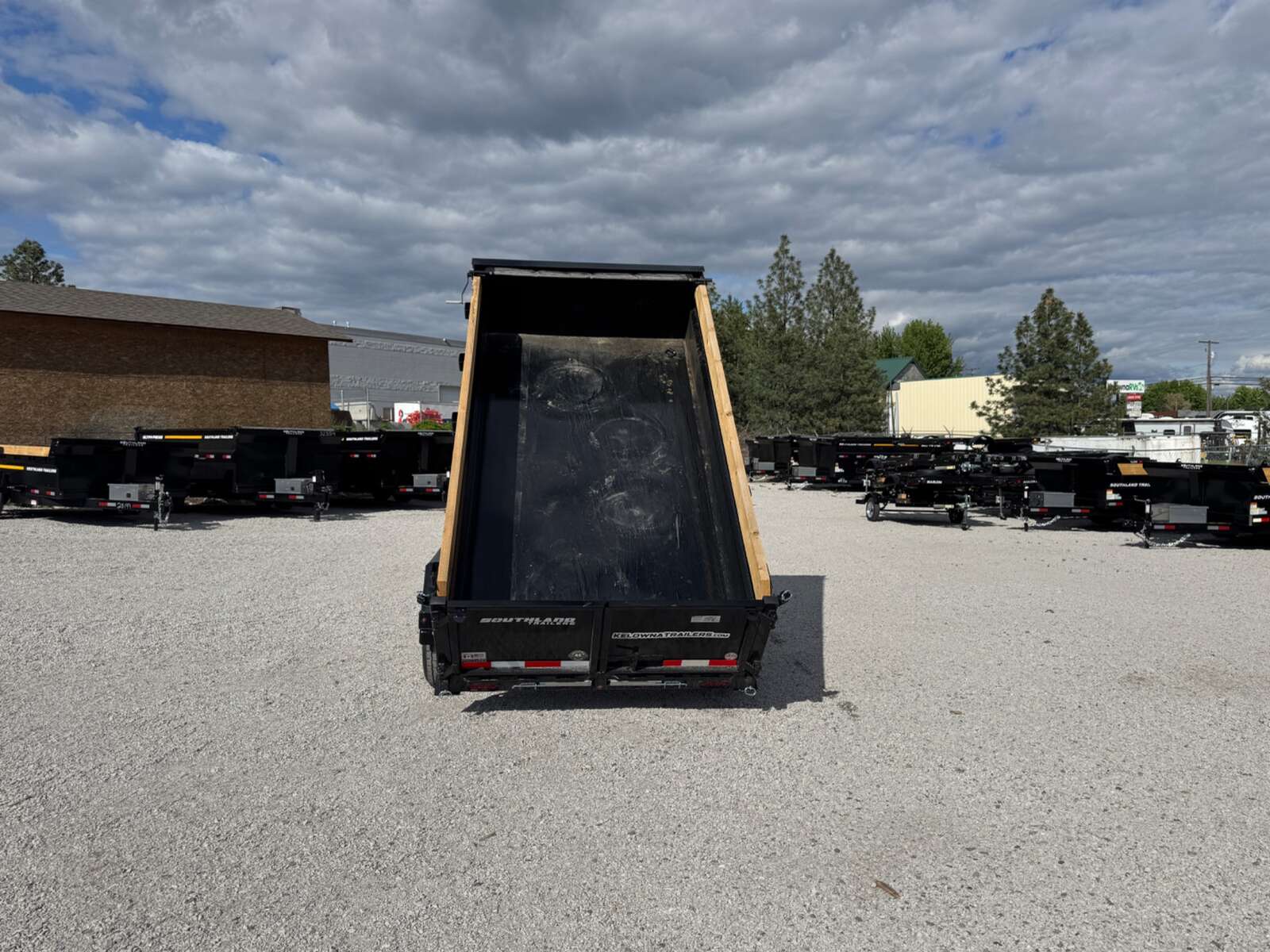 Photo of 2025 Southland 5x10 Dump Trailer 11,464lbs GVW Black w/ Tarp & Ramps