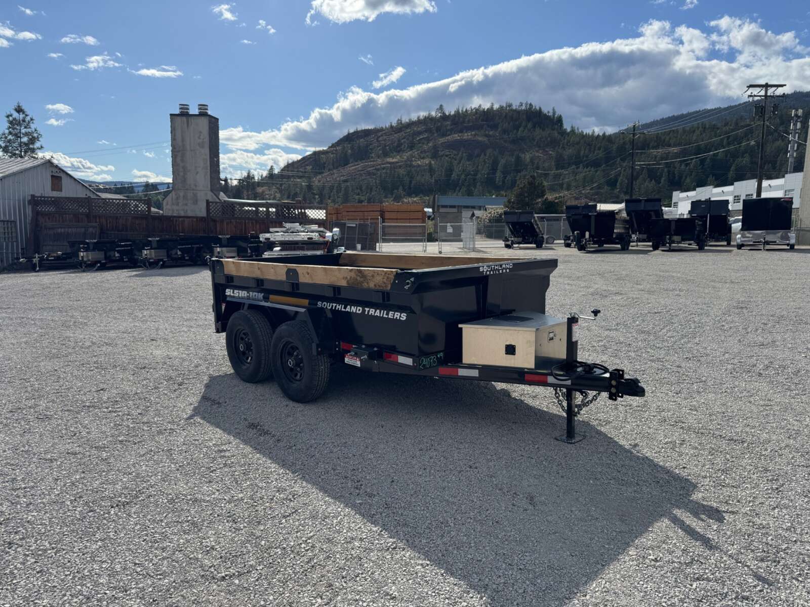 Photo of 2025 Southland 5x10 Dump Trailer 11,464lbs GVW Black w/ Tarp & Ramps