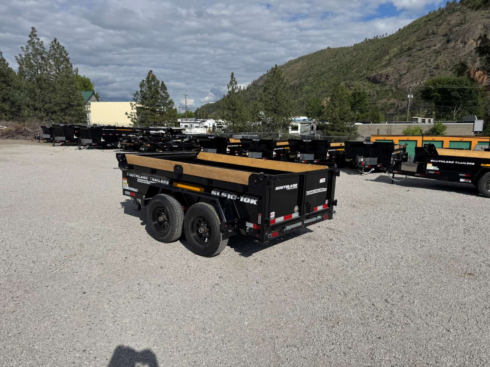 Photo of 2025 Southland 5x10 Dump Trailer 11,464lbs GVW Black w/ Tarp & Ramps