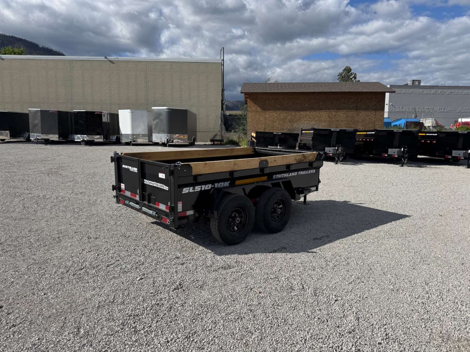 Photo of 2025 Southland 5x10 Dump Trailer 11,464lbs GVW Black w/ Tarp & Ramps