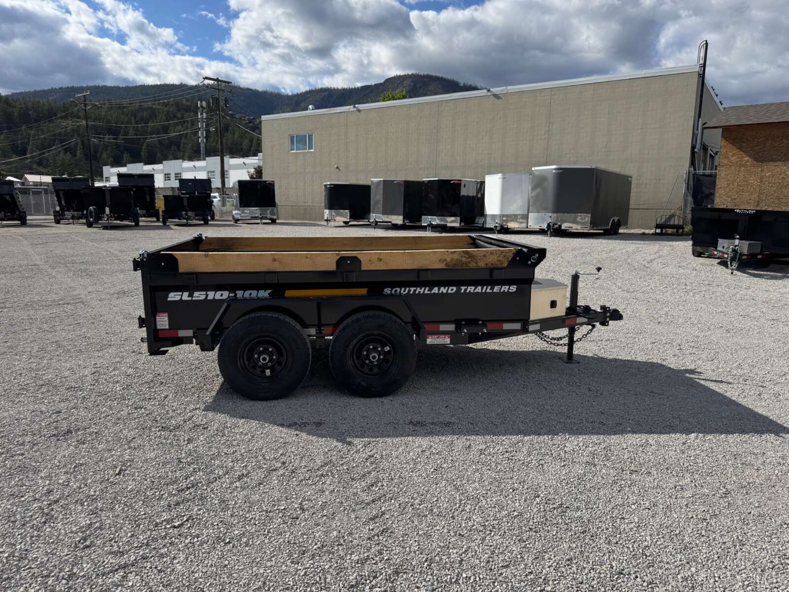 Photo of 2025 Southland 5x10 Dump Trailer 11,464lbs GVW Black w/ Tarp & Ramps