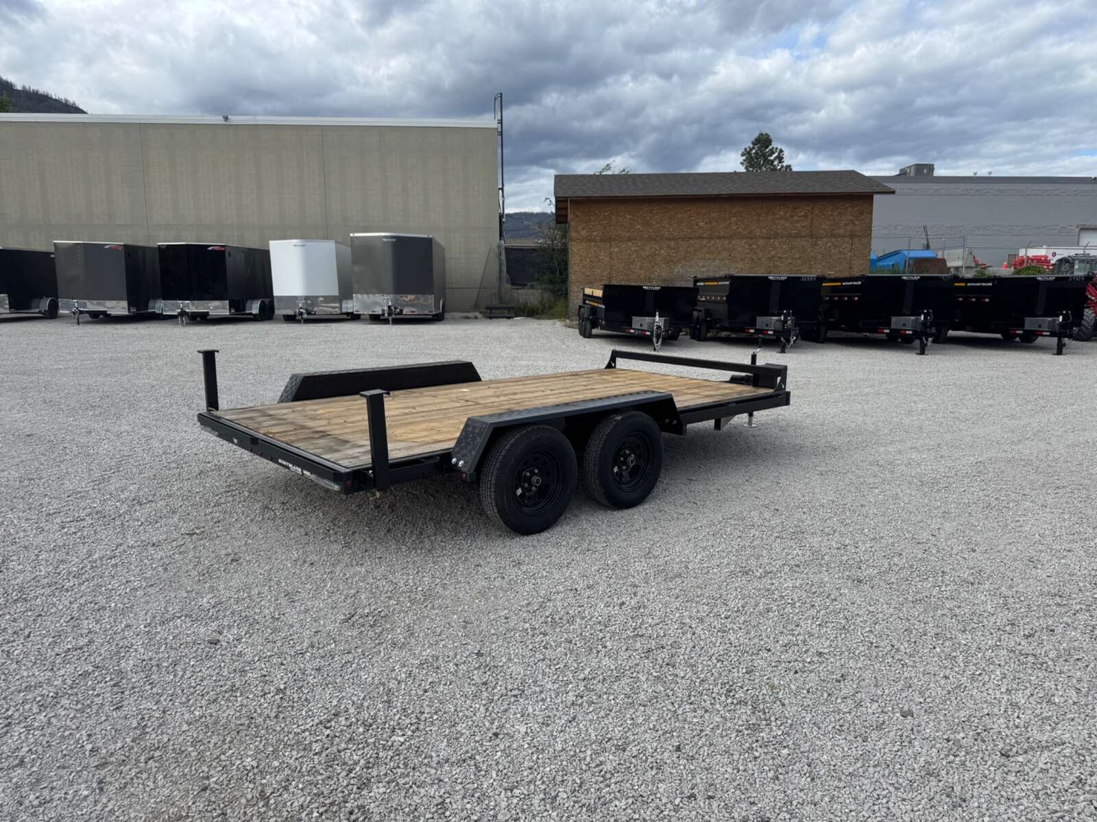 Photo of 2026 Southland 7X14 FLATBED TRAILER FLAT DECK 7,700LB GVW w/ Slide in ramps