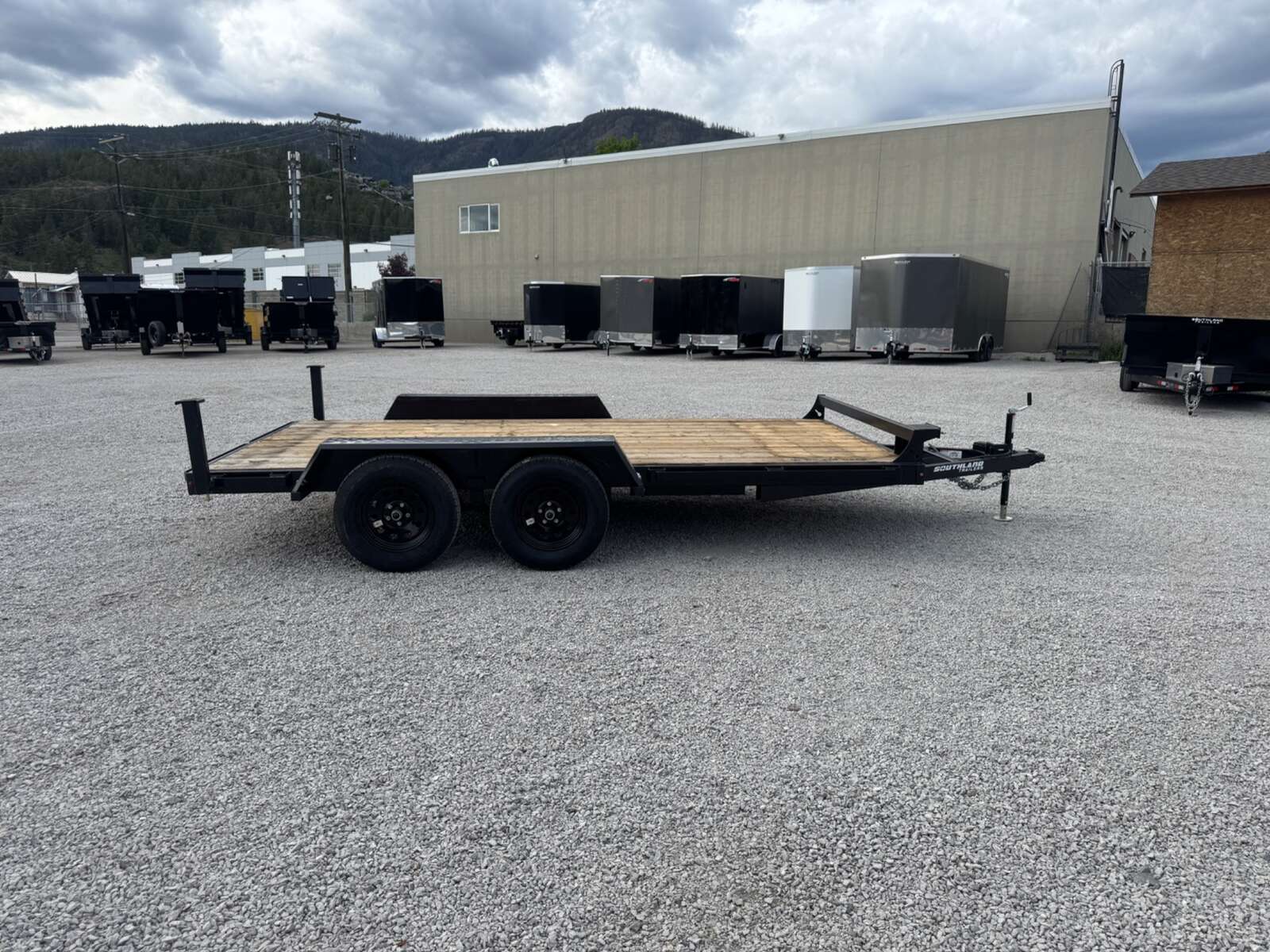 Photo of 2026 Southland 7X14 FLATBED TRAILER FLAT DECK 7,700LB GVW w/ Slide in ramps