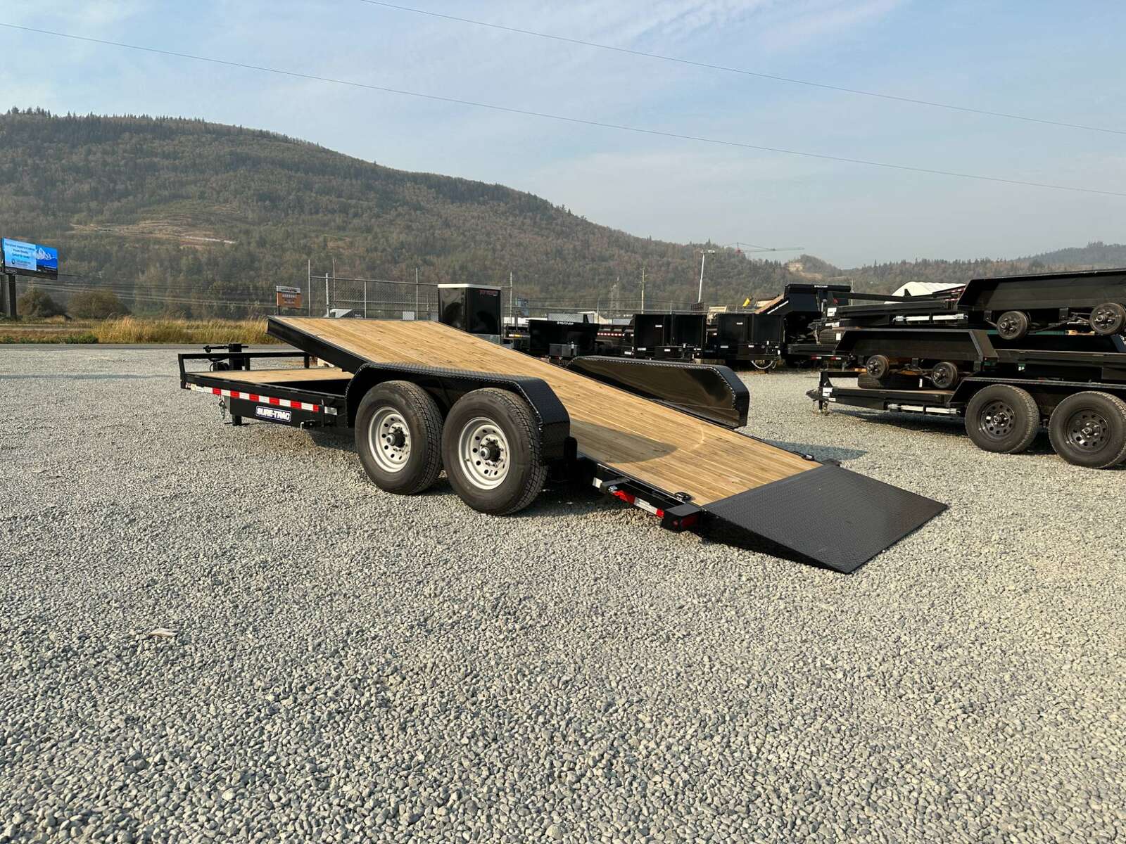 Photo of 2025 Suretrac 7x16+4 HD Tilt Deck Equipment Trailer w/ 4ft Stationary Section 14,000lb GVW