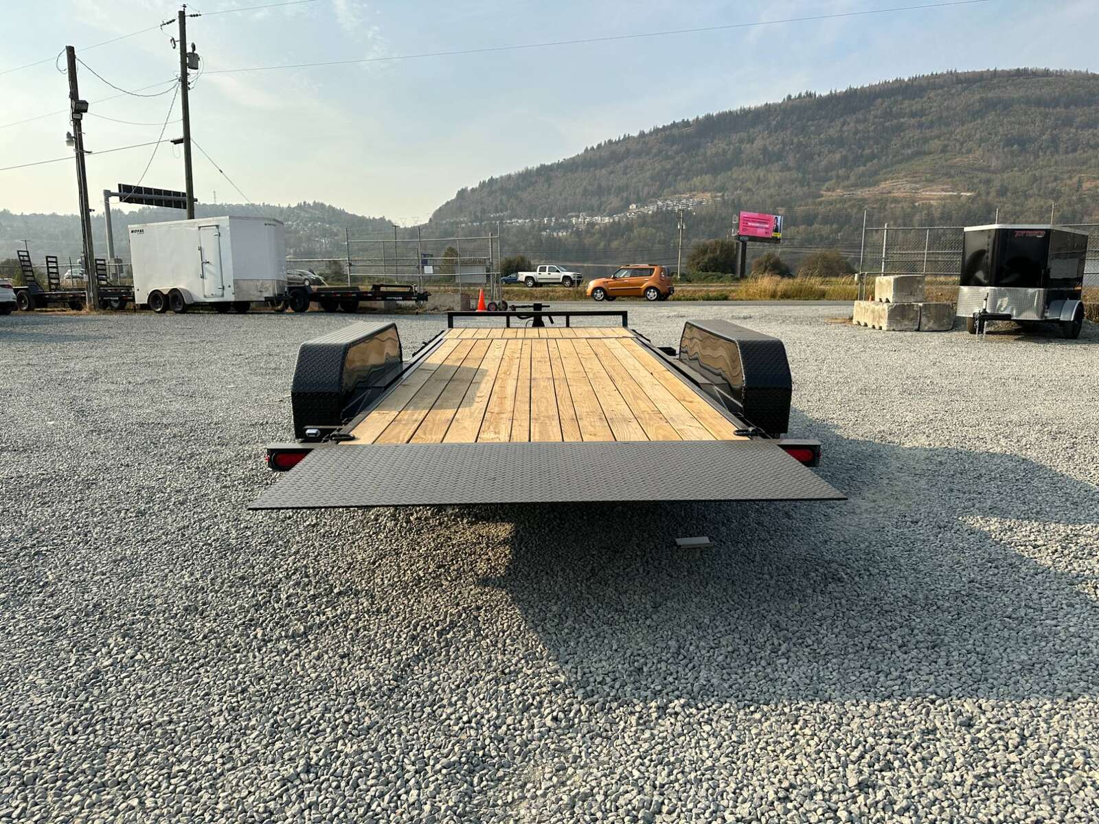 Photo of 2025 Suretrac 7x16+4 HD Tilt Deck Equipment Trailer w/ 4ft Stationary Section 14,000lb GVW