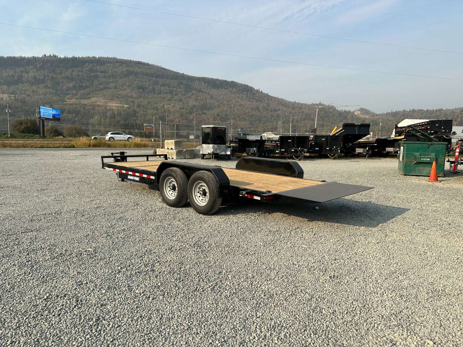 Photo of 2025 Suretrac 7x16+4 HD Tilt Deck Equipment Trailer w/ 4ft Stationary Section 14,000lb GVW