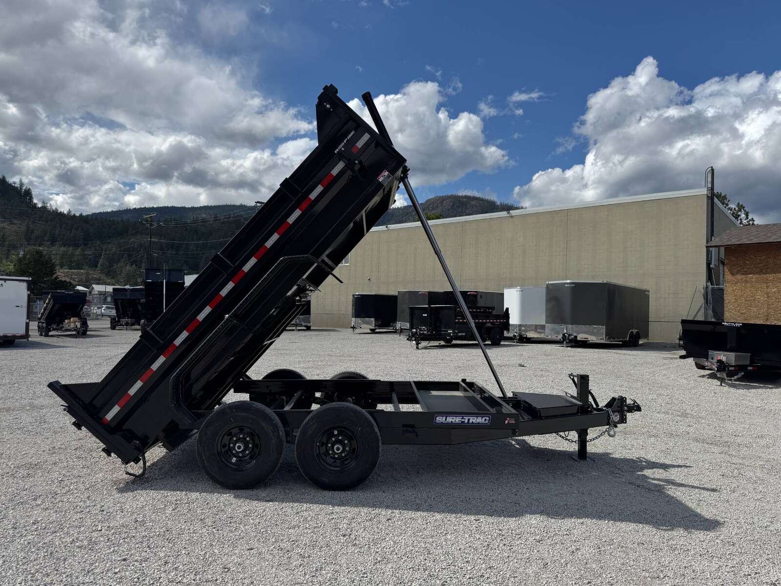 Photo of New Suretrac 7x12 Telescopic Hoist Dump Trailer 15,500lbs GVW w/ Ramps and Tarp