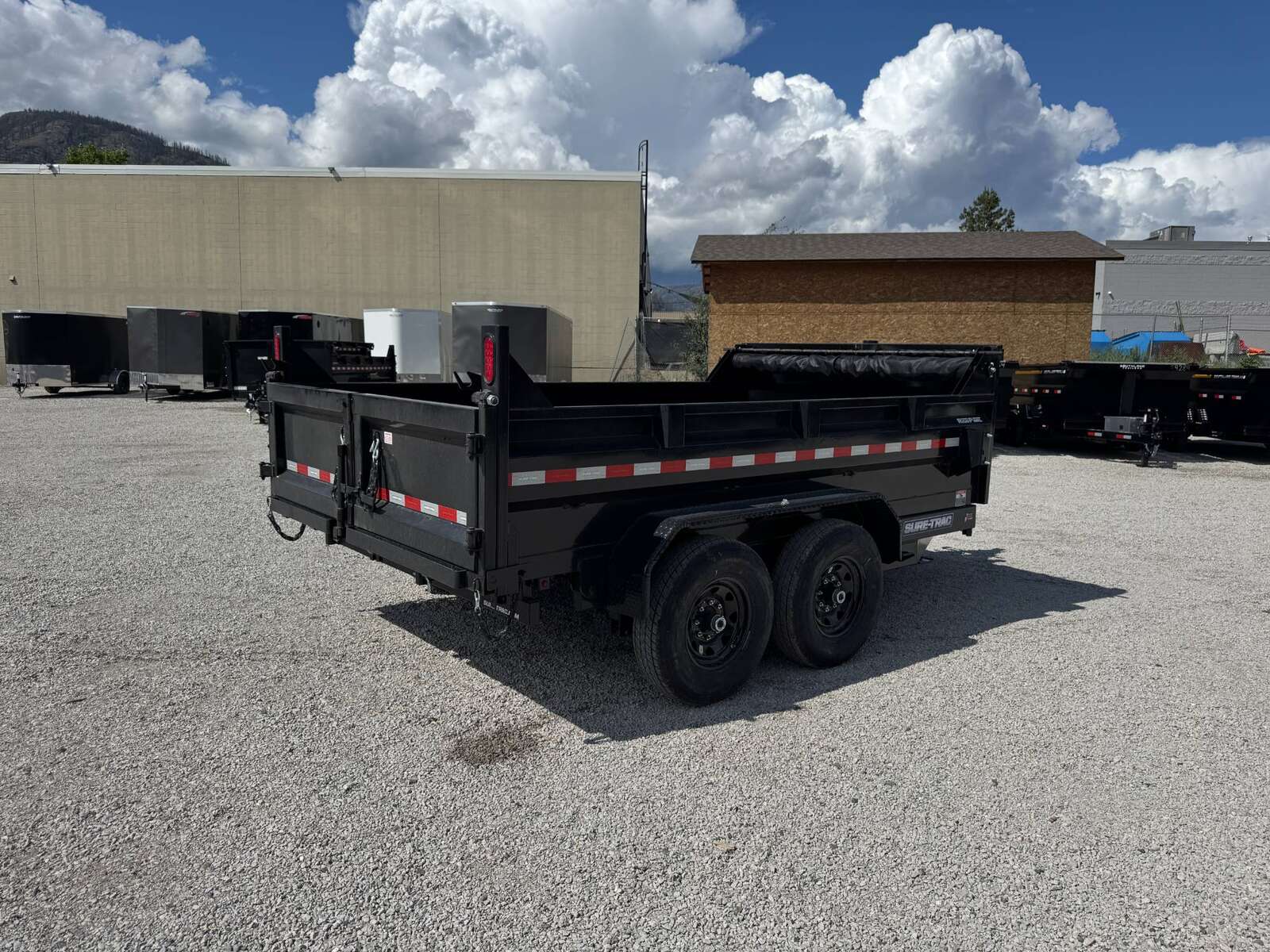 Photo of New Suretrac 7x12 Telescopic Hoist Dump Trailer 15,500lbs GVW w/ Ramps and Tarp