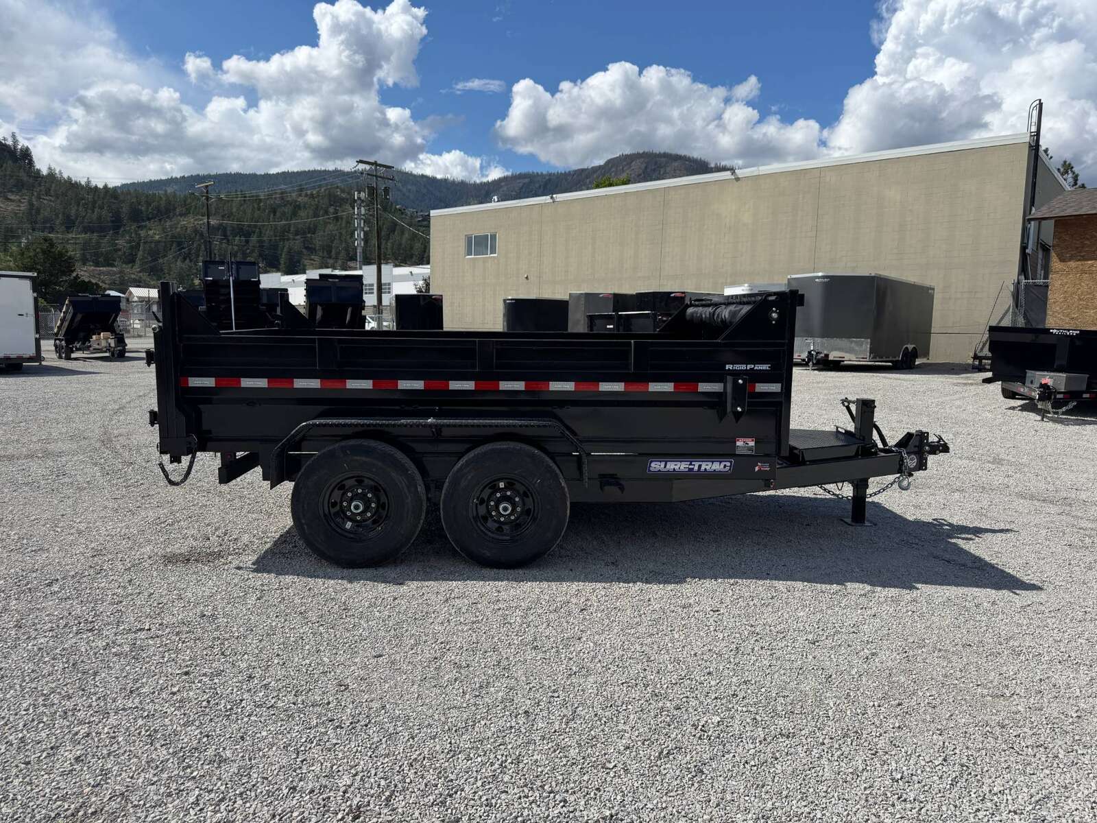 Photo of New Suretrac 7x12 Telescopic Hoist Dump Trailer 15,500lbs GVW w/ Ramps and Tarp