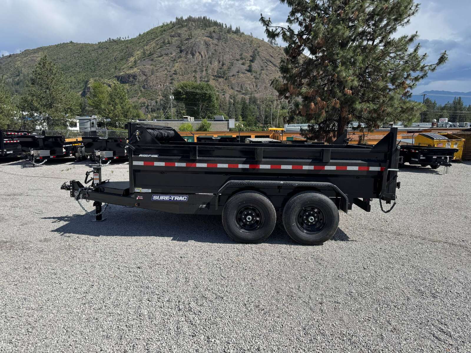 Photo of New Suretrac 7x12 Telescopic Hoist Dump Trailer 15,500lbs GVW w/ Ramps and Tarp