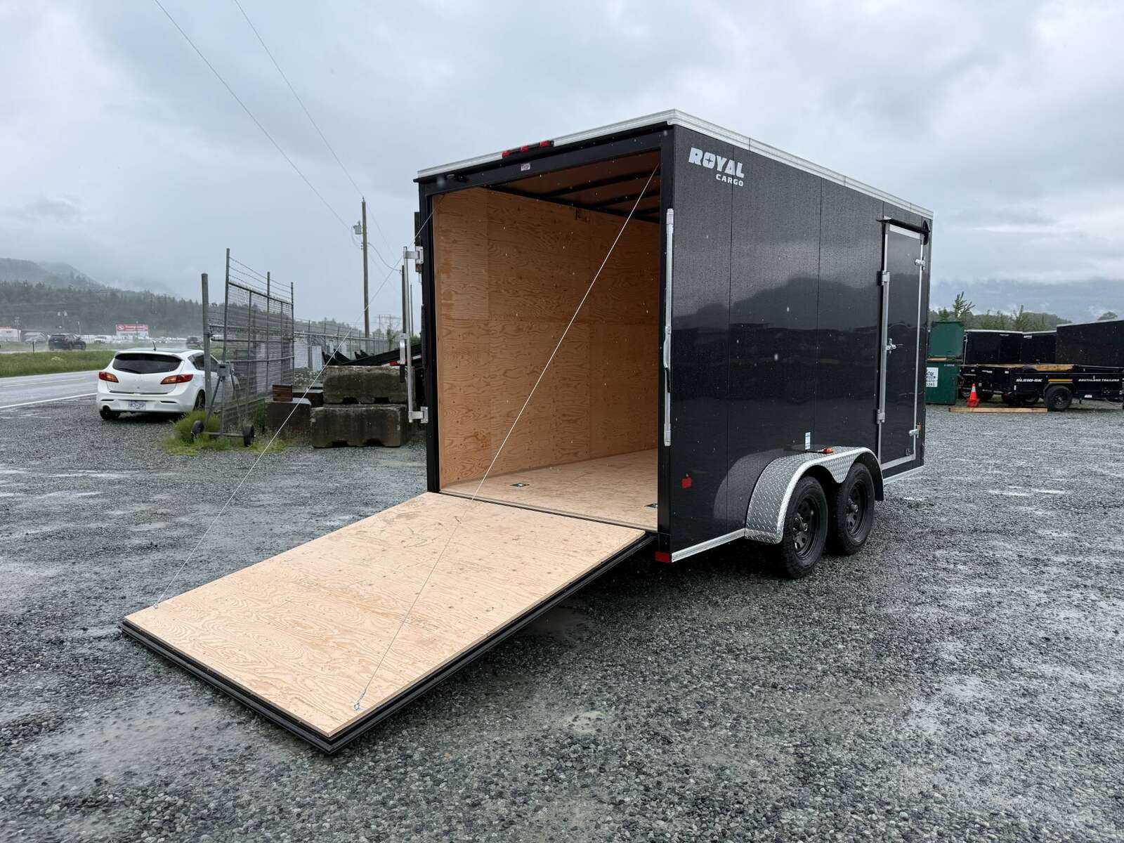 Photo of 2026 Royal Cargo 7X14 V Nose 7700LB GVW RAMP DOOR Black Enclosed Cargo Trailer Extra Tall