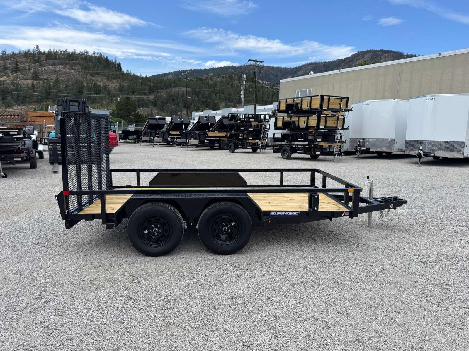 Photo of 2025 Suretrac 6x12 Tube Top Utility Trailer Tandem Axle 7000lb GVW w/ Ramp Gate