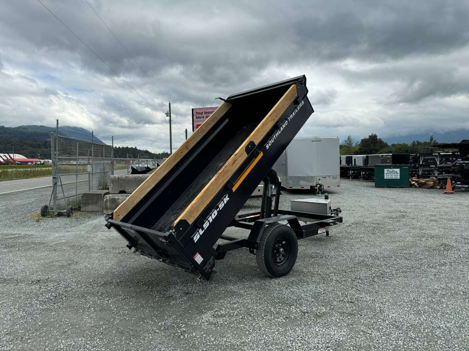 Photo of 2026 Southland 5x10 Dump Trailer Single Axle 5700lb GVW with Tarp and Ramps