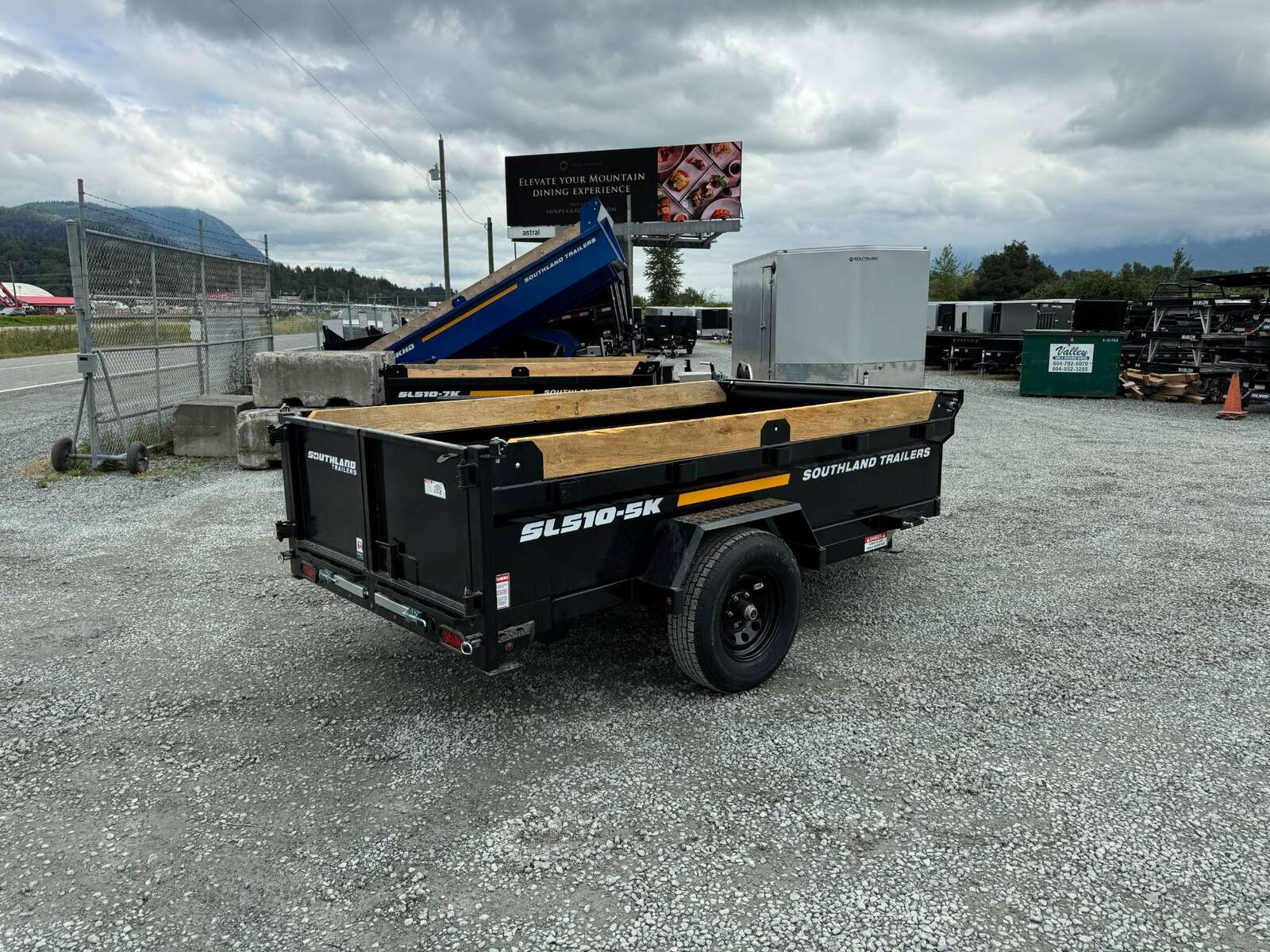 Photo of 2026 Southland 5x10 Dump Trailer Single Axle 5700lb GVW with Tarp and Ramps