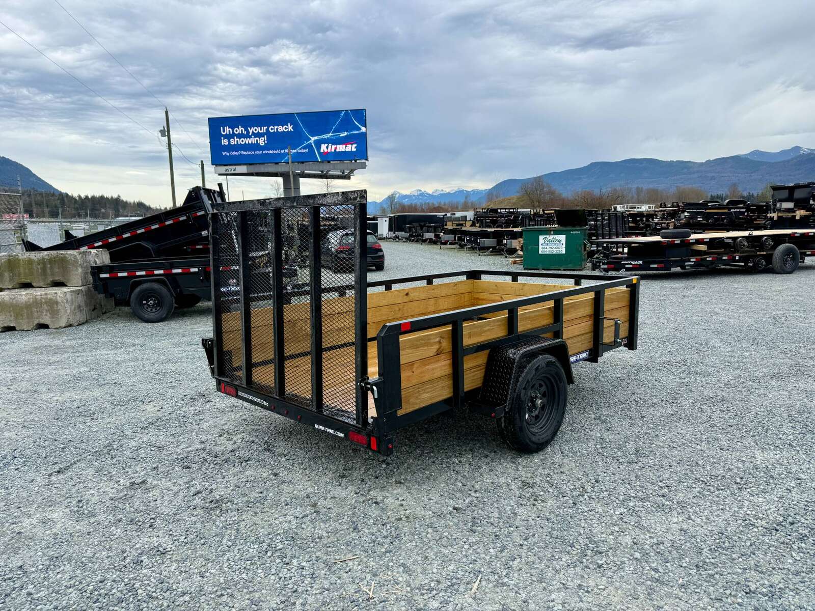 Photo of 2025 Suretrac 6x10 Landscape Utility Trailer 3 Board High Side w/ Ramp Gate 2990lb GVW