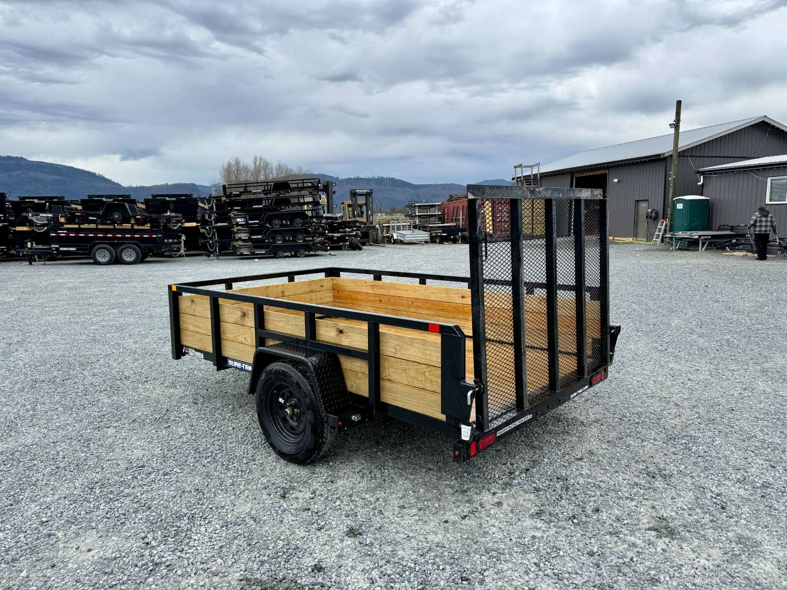 Photo of 2025 Suretrac 6x10 Landscape Utility Trailer 3 Board High Side w/ Ramp Gate 2990lb GVW