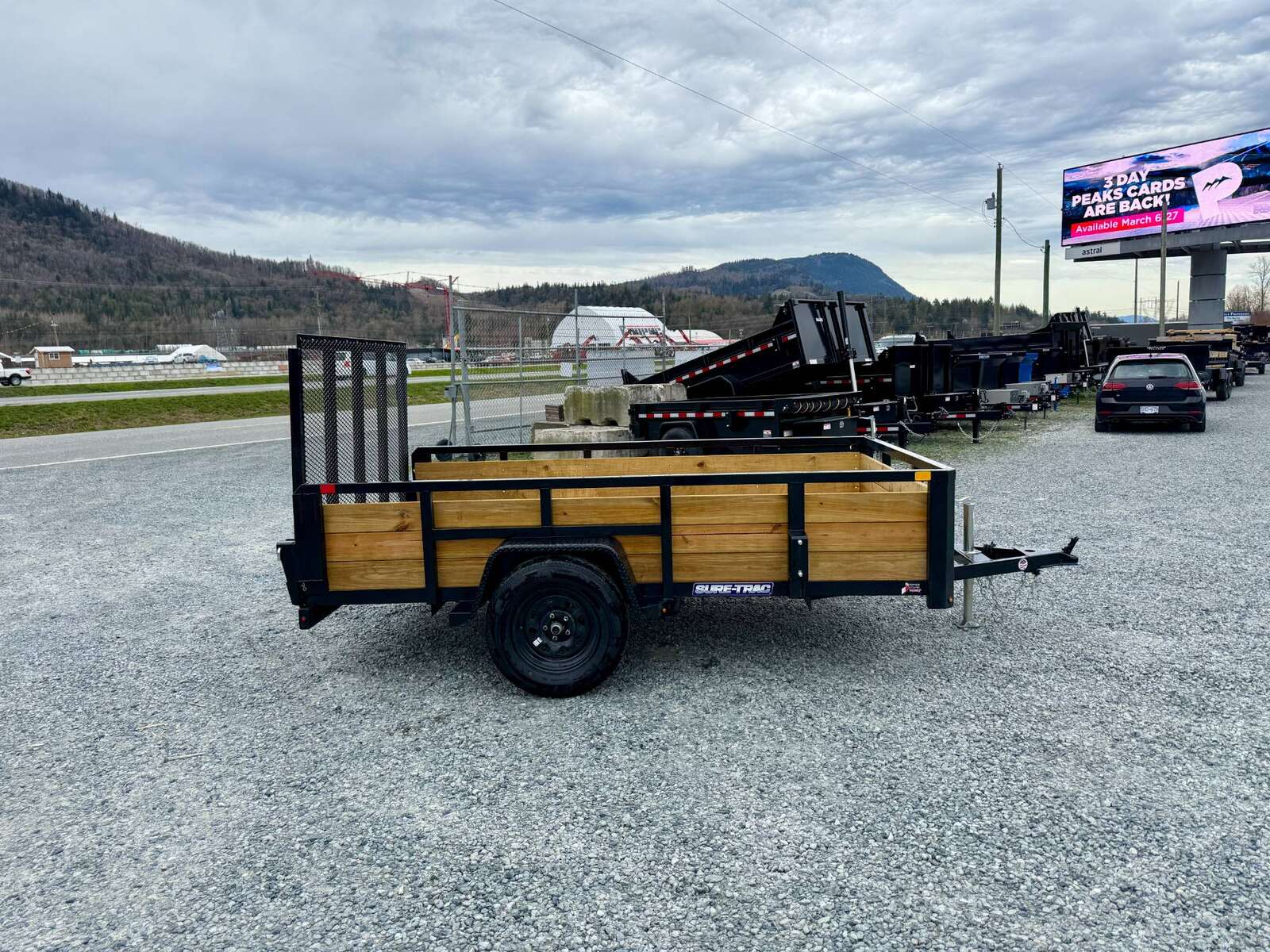 Photo of 2025 Suretrac 6x10 Landscape Utility Trailer 3 Board High Side w/ Ramp Gate 2990lb GVW