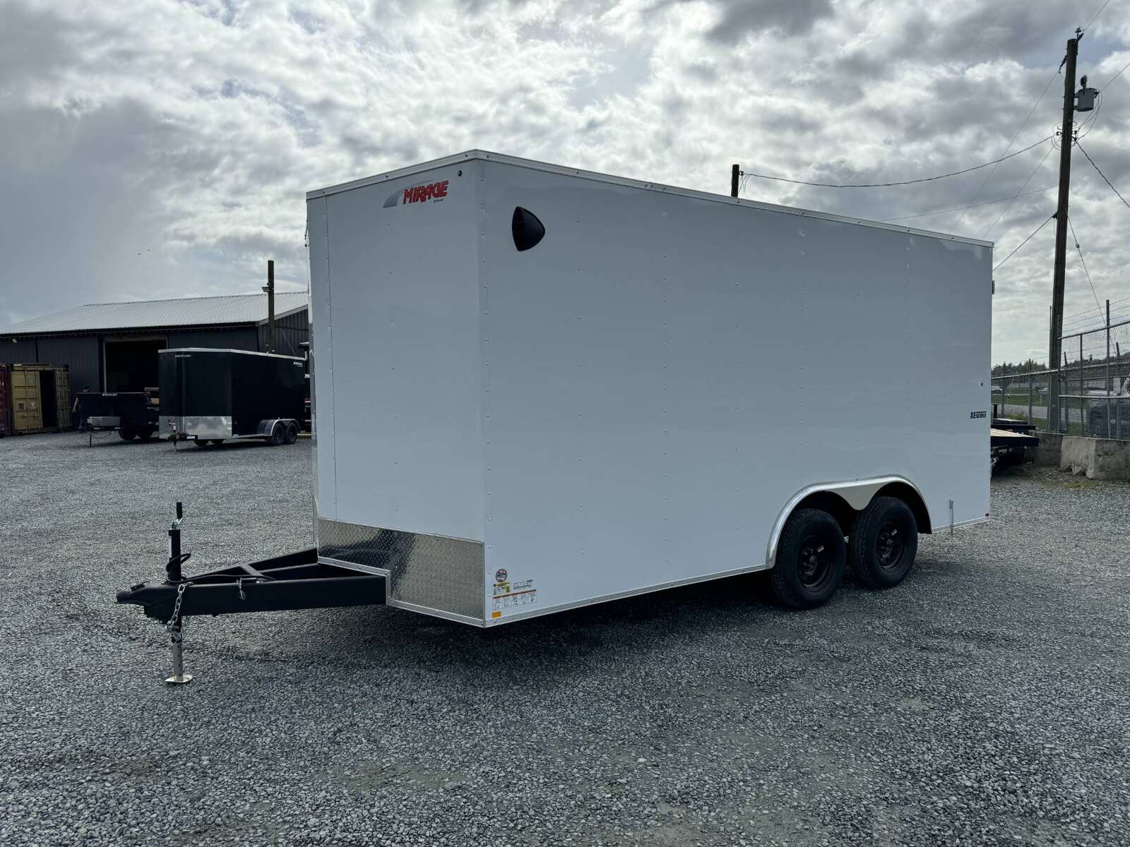 Photo of 2026 Mirage 8.5x16 XE V Nose 7000lb GVW Cargo / Enclosed Trailer Extra Heigh Barn Door White