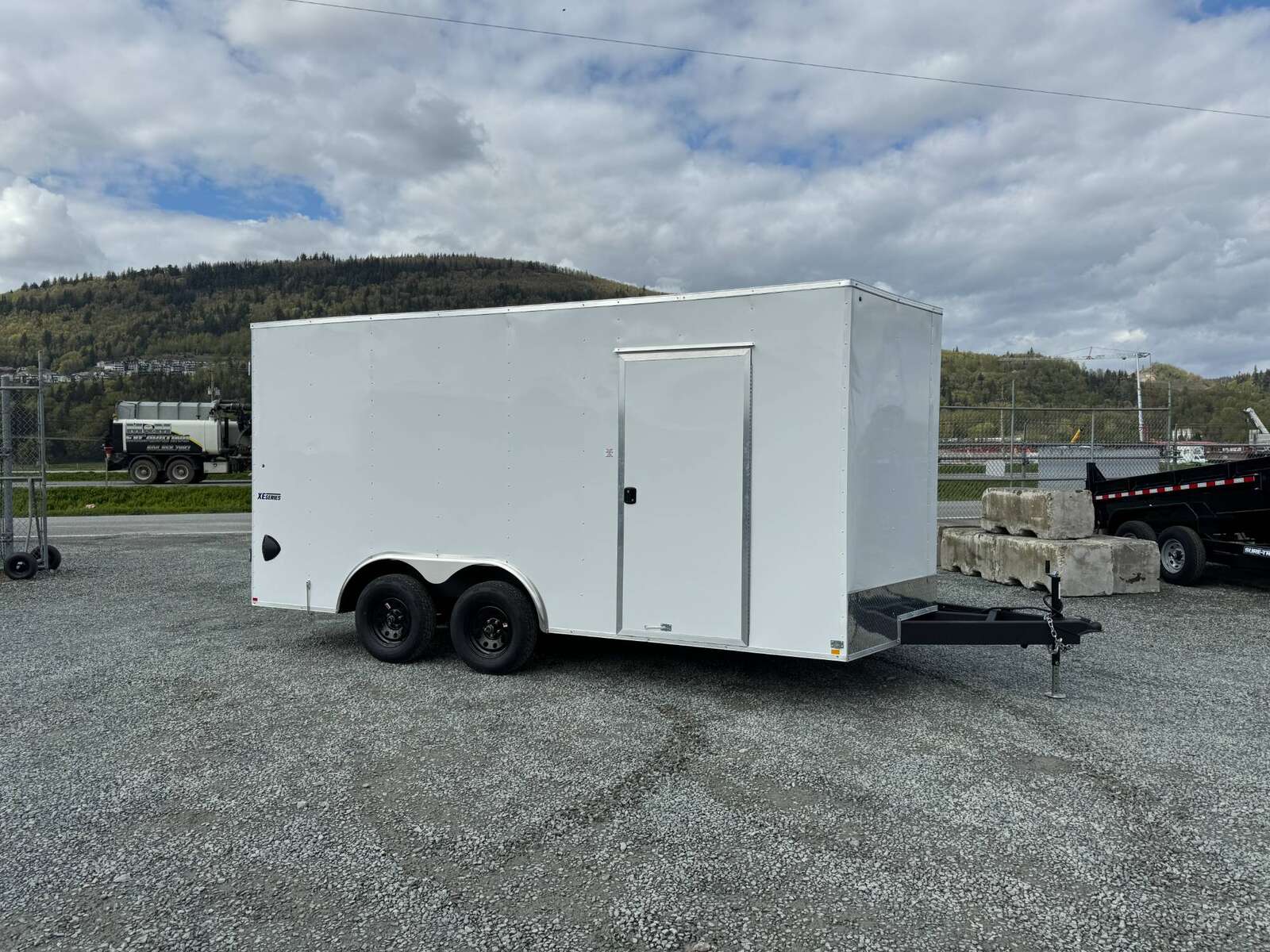 Photo of 2026 Mirage 8.5x16 XE V Nose 7000lb GVW Cargo / Enclosed Trailer Extra Heigh Barn Door White