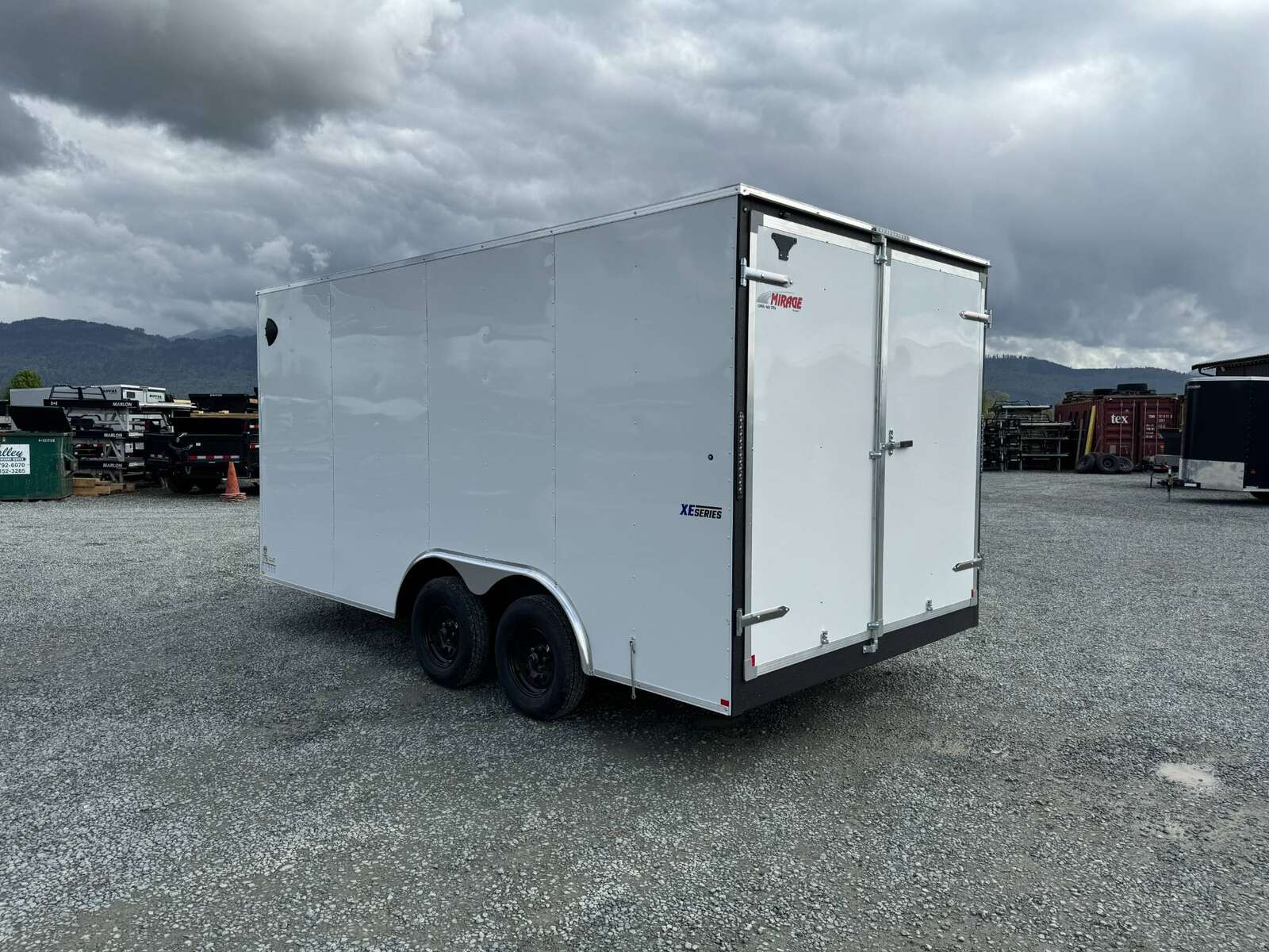 Photo of 2026 Mirage 8.5x16 XE V Nose 7000lb GVW Cargo / Enclosed Trailer Extra Heigh Barn Door White